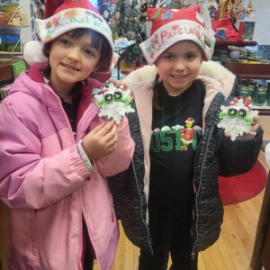Chrissy and Sean With Their Personalized Christmas Ornaments in Maine